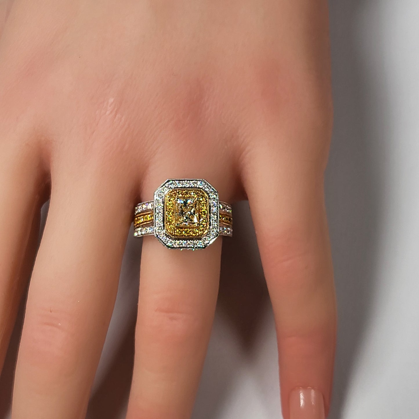 0.61ct Yellow and white diamond ring