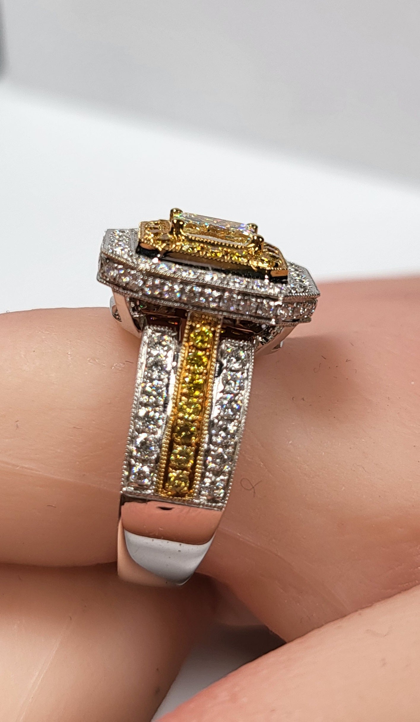 0.61ct Yellow and white diamond ring