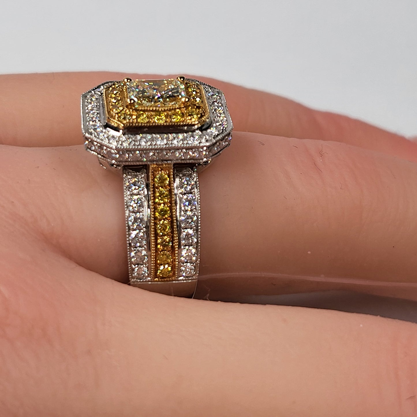 0.61ct Yellow and white diamond ring