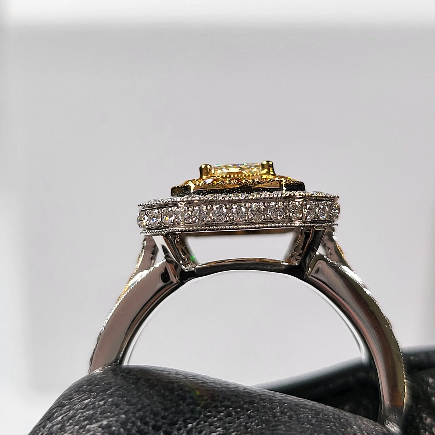 0.61ct Yellow and white diamond ring