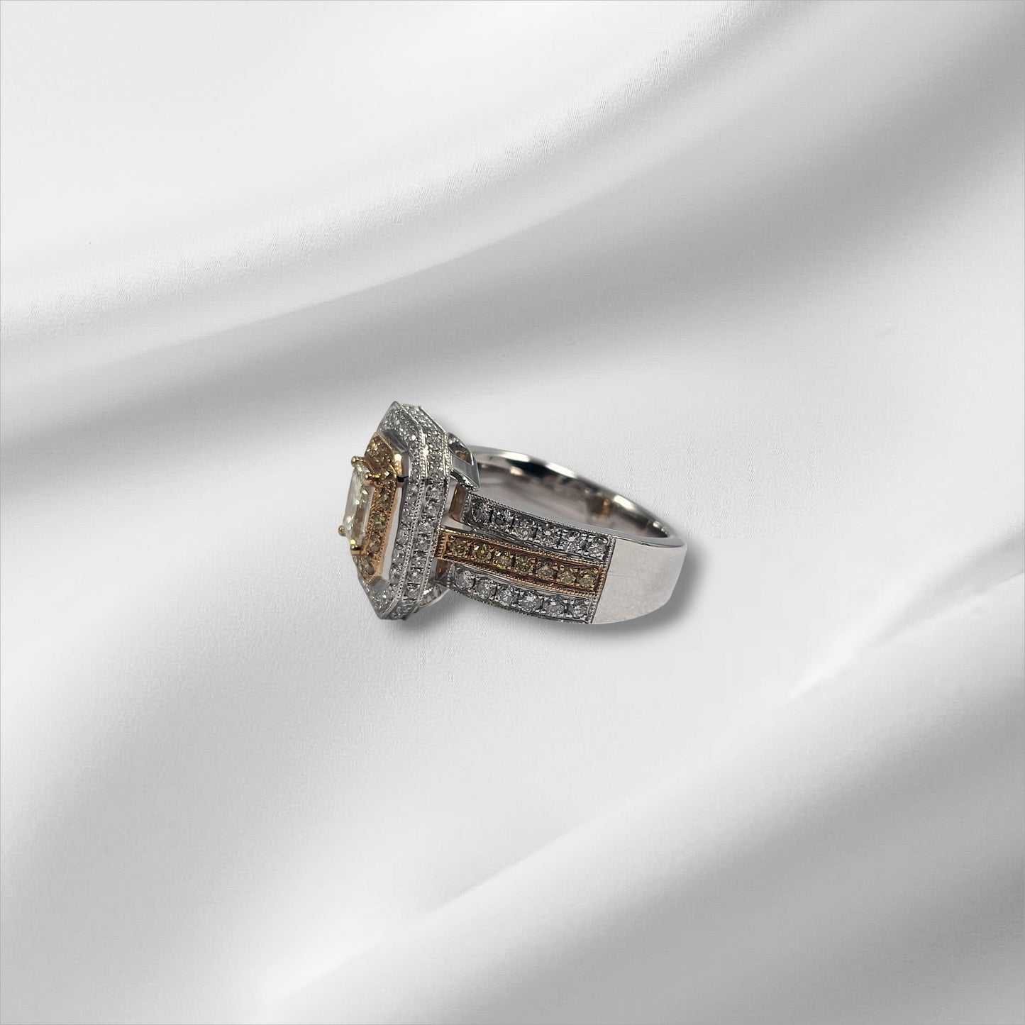 0.61ct Yellow and white diamond ring