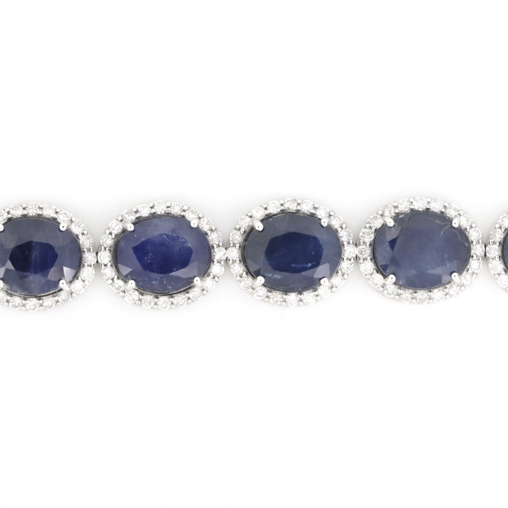 Blue Sapphire and Diamond Halo Bracelet
