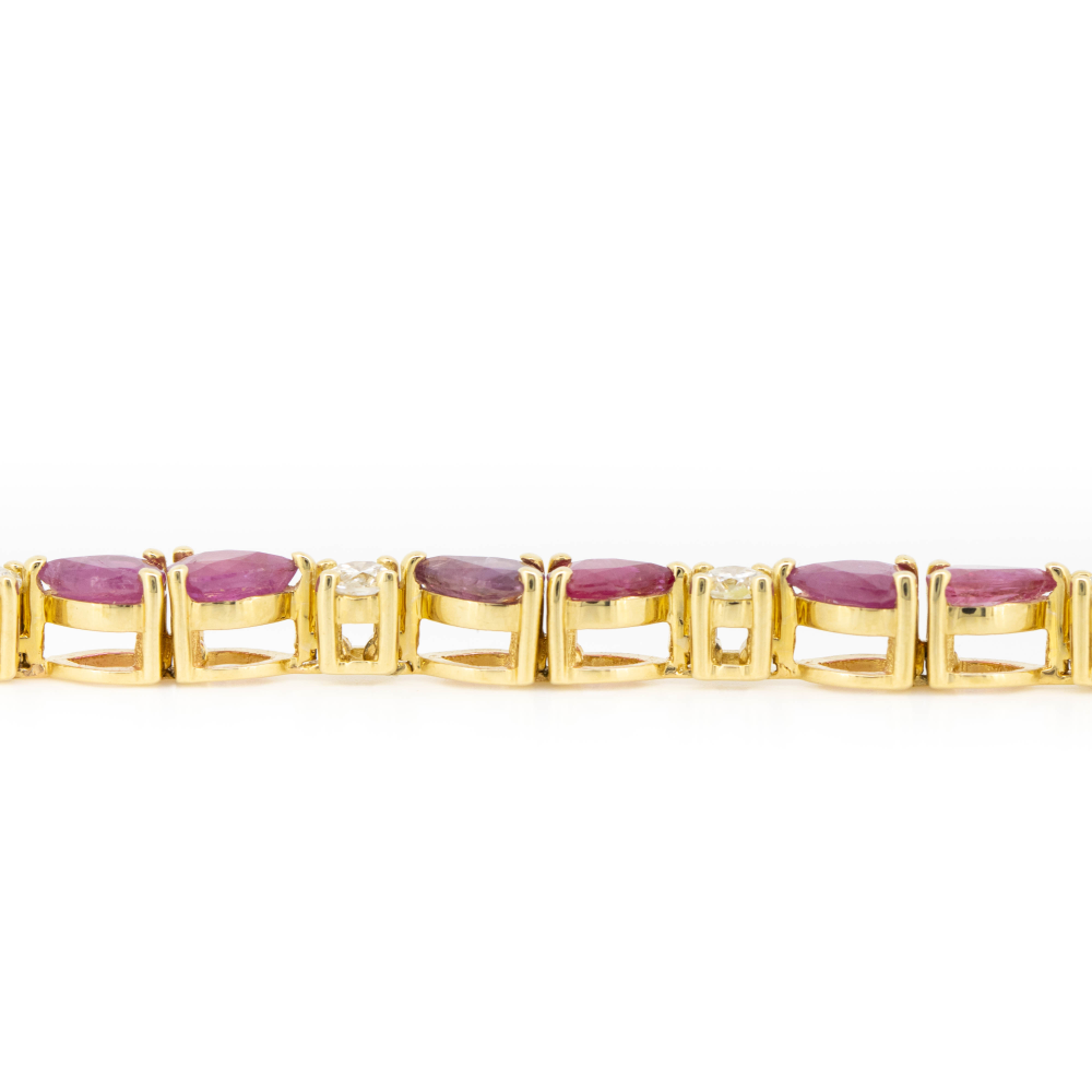 Yellow Gold Pear Cut Ruby and Diamond Line Bracelet