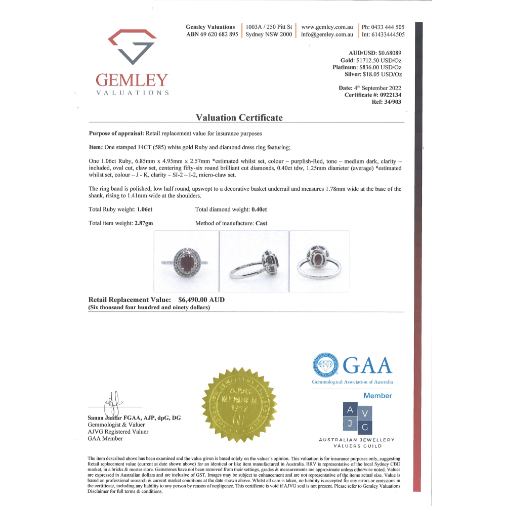 1.06ct Oval cut White Gold, Ruby and Diamond Double Halo Ring