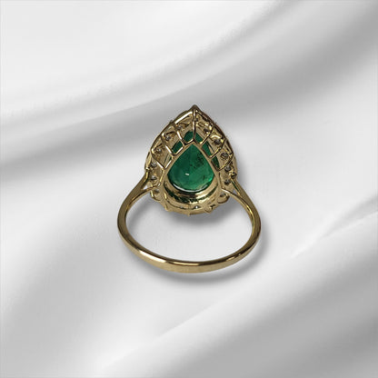 Pear Cut Emerald and Diamond Halo Ring