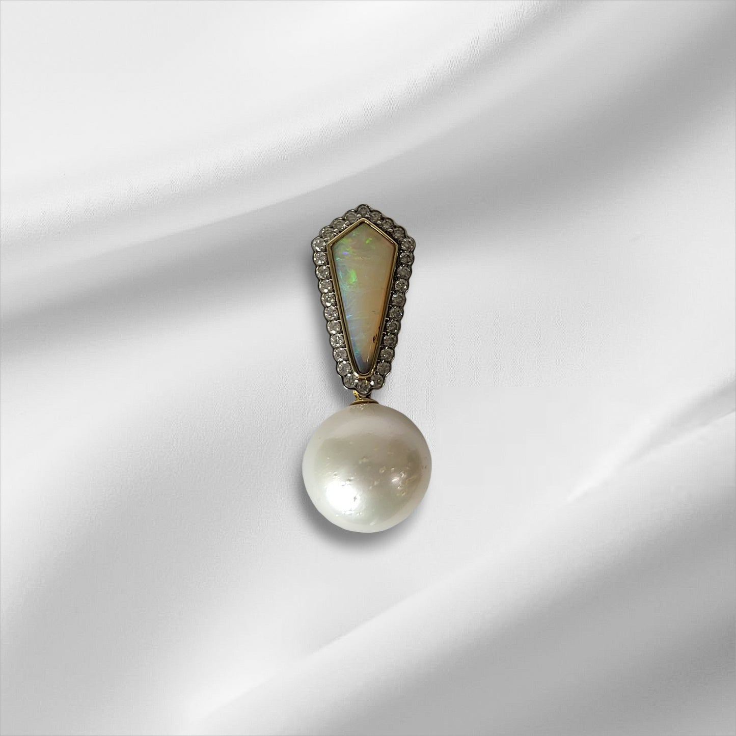 White Cultured South Sea Pearl, Coober Pedy Opal and Diamond Pendant