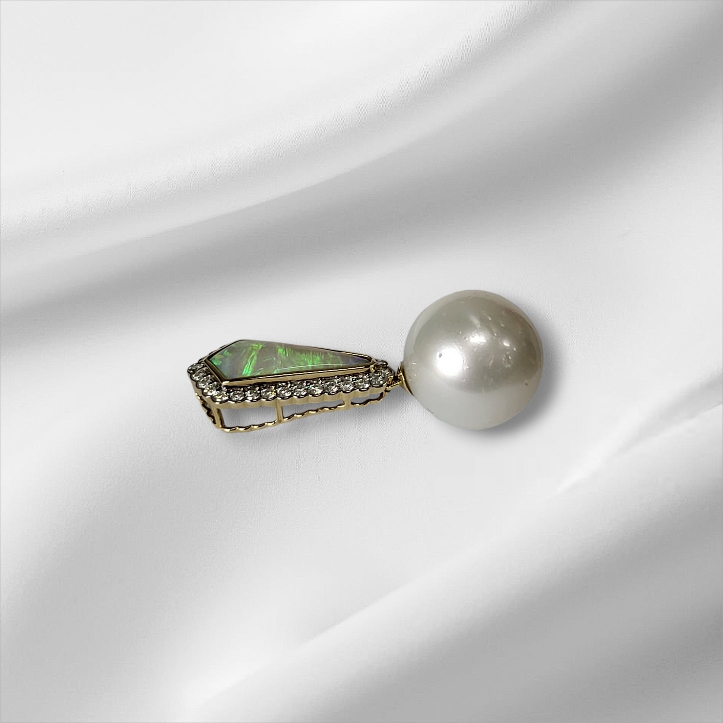 White Cultured South Sea Pearl, Coober Pedy Opal and Diamond Pendant