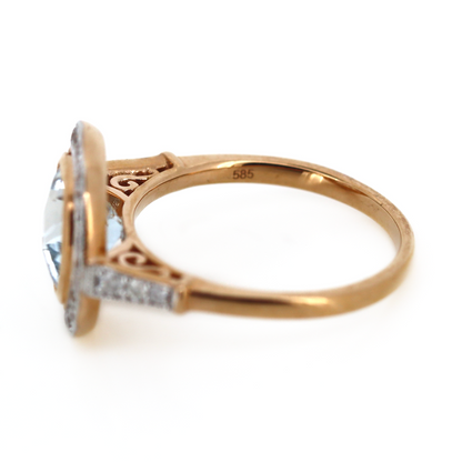 Rose Gold Aquamarine and Diamond Halo Ring
