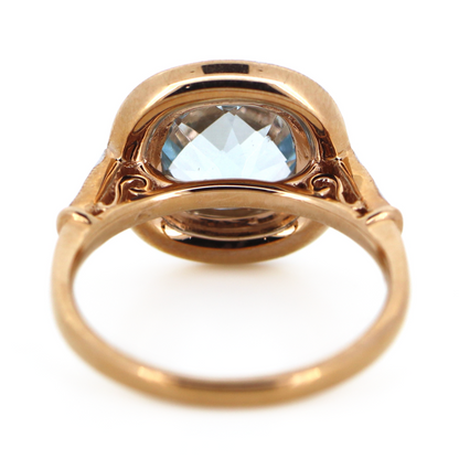 Rose Gold Aquamarine and Diamond Halo Ring