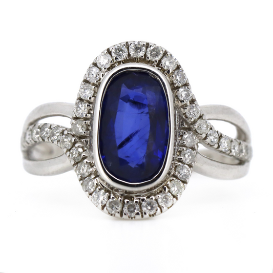 1.66ct White Gold Blue Sapphire and Diamond Halo Ring
