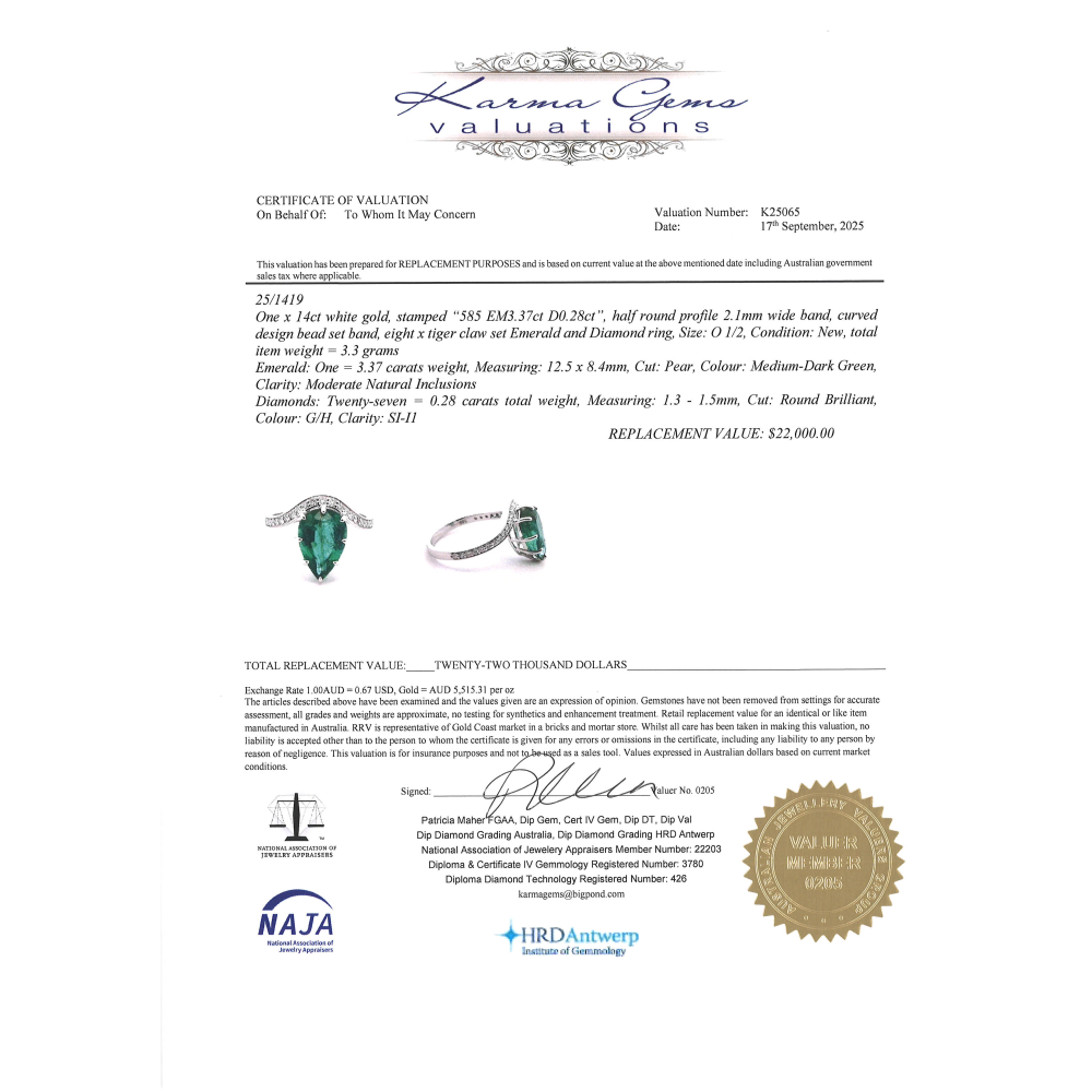 White Gold Pear Cut Emerald & Diamond Ring