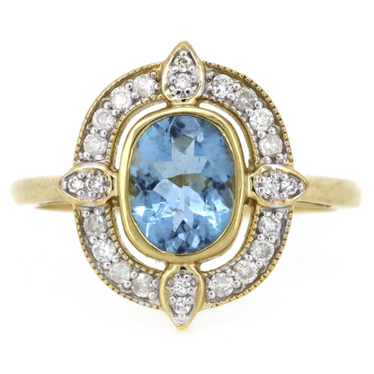 1.06ct Yellow Gold Aquamarine and Diamond Halo Dress Ring