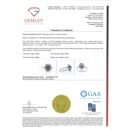 1.06ct Oval cut White Gold, Ruby and Diamond Double Halo Ring