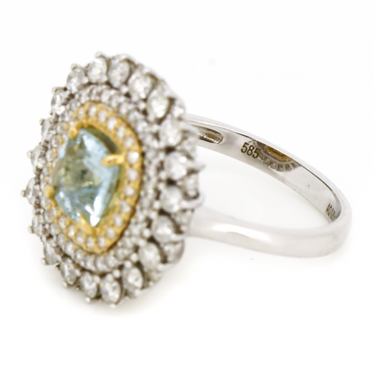 White and Yellow Gold Aquamarine and Diamond Triple Halo Ring