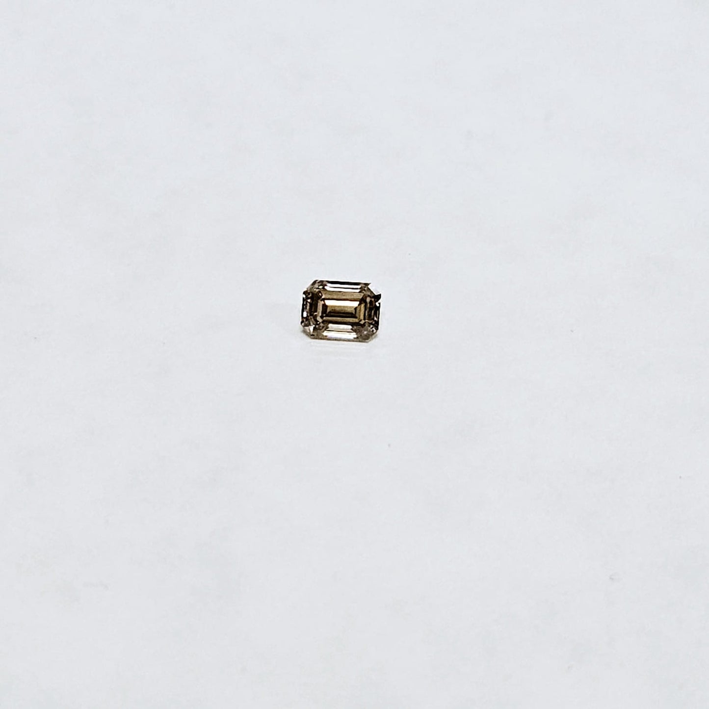 1.01 CT Emerald Cut Champagne Natural Diamond