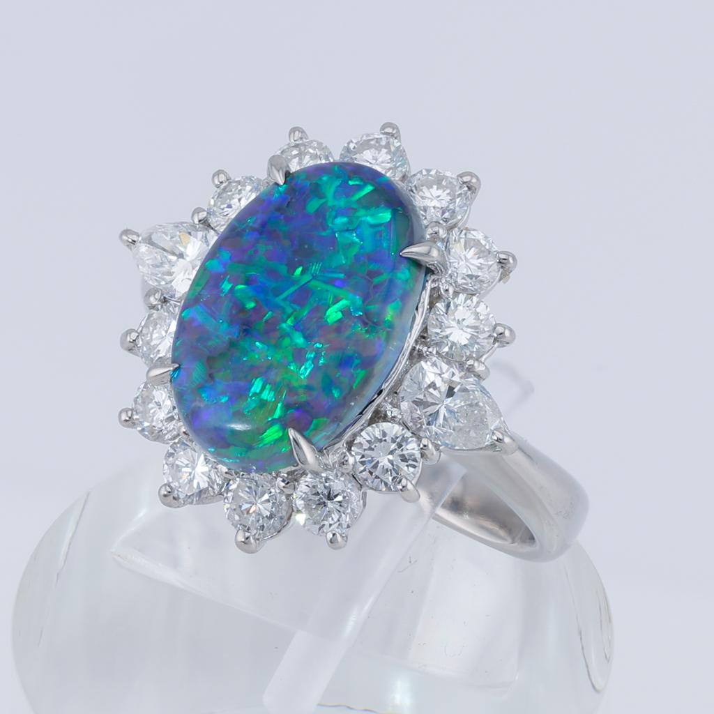 2.63ct Oval Cabochon Natural Opal Ring with Diamond Halo