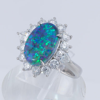 2.63ct Oval Cabochon Natural Opal Ring with Diamond Halo