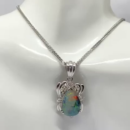 2.87ct Pear Cabochon Natural Opal Pendant Surrounded by Round Brilliant Cut Diamonds